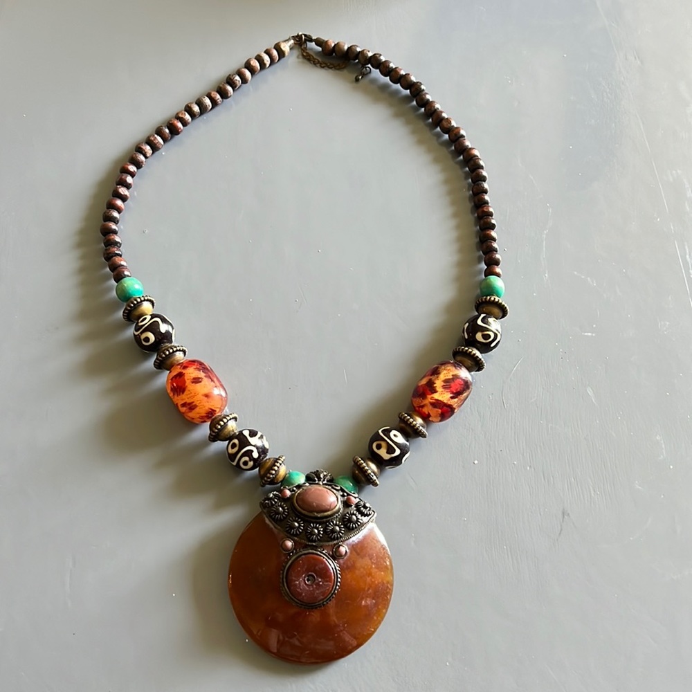 amber, turquoise, bronze and tiger tones in this great adjustable necklace